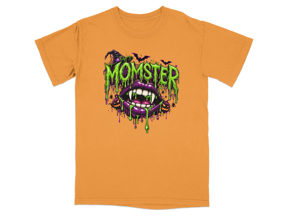 Orange t-shirt with green "MOMSTER" text, dripping purple lips, and Halloween motifs.