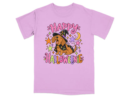Dachshund in witch hat and cape with "Happy Halloweenie" text and stars.