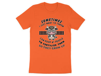 Orange t-shirt with a grumpy cow holding a cup and text about cow poop.