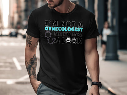 Black t-shirt with text: I'M NOT A GYNECOLOGIST BUT I'LL TAKE A LOOK.