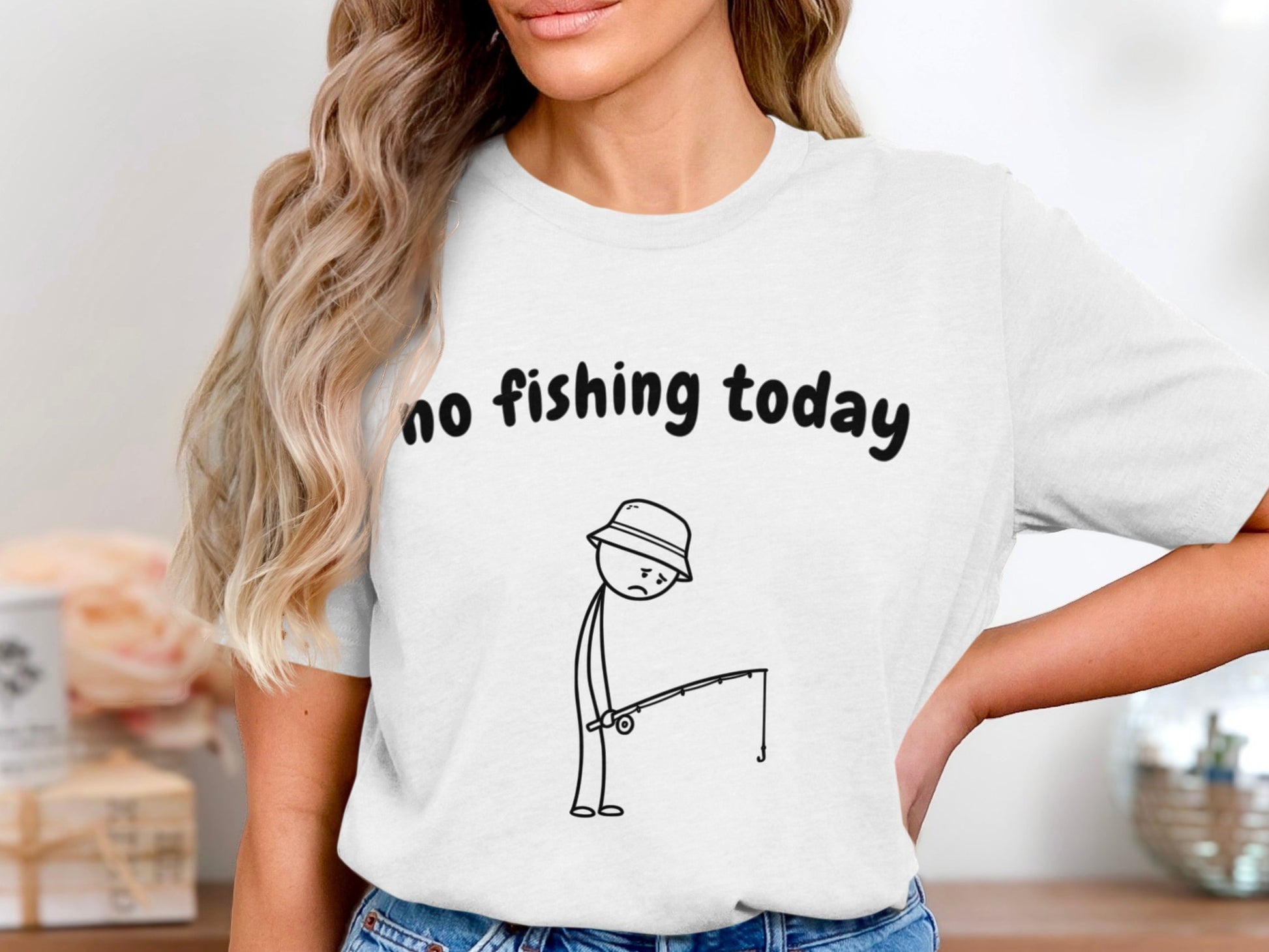 White t-shirt with "no fishing today" text and sad stick figure with fishing rod.