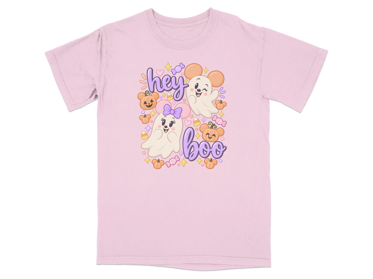 Pink t-shirt with cartoon ghosts, pumpkins, candy, and the text "hey boo".