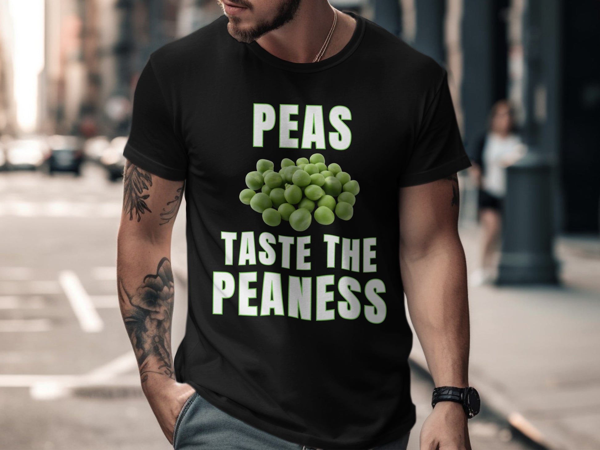 Black t-shirt with "PEAS TASTE THE PEANESS" text and peas graphic.