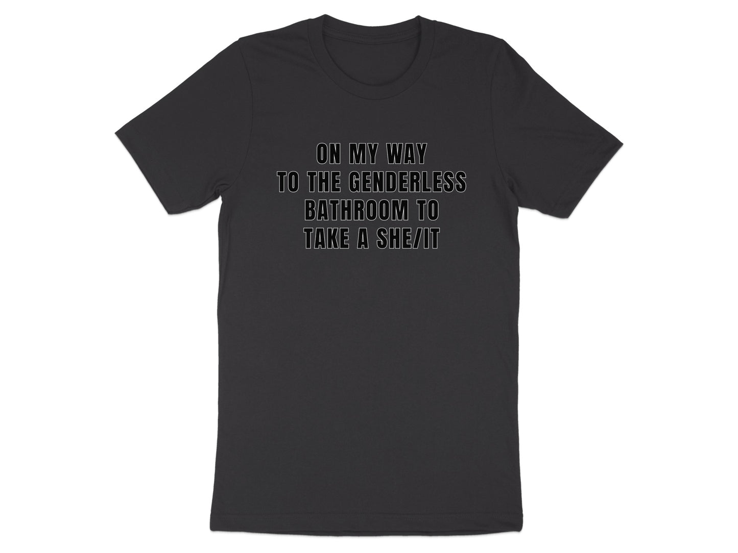 Dark t-shirt with white text reading "On my way to the genderless bathroom to take a she/it."