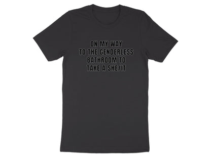 Dark t-shirt with white text reading "On my way to the genderless bathroom to take a she/it."