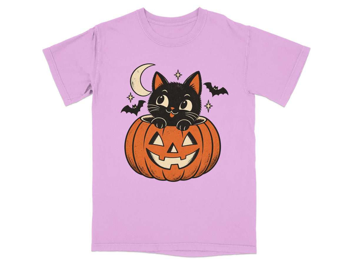 Black cat in jack-o'-lantern with moon, stars, and bats.