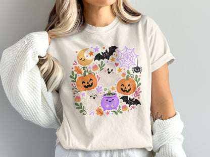 Halloween graphic with pumpkins, ghosts, bats, moon, cauldron, candy corn, and spiderweb.