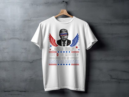 White t-shirt with Donald Trump graphic and text "The D is missing because it's in every haters mouth."