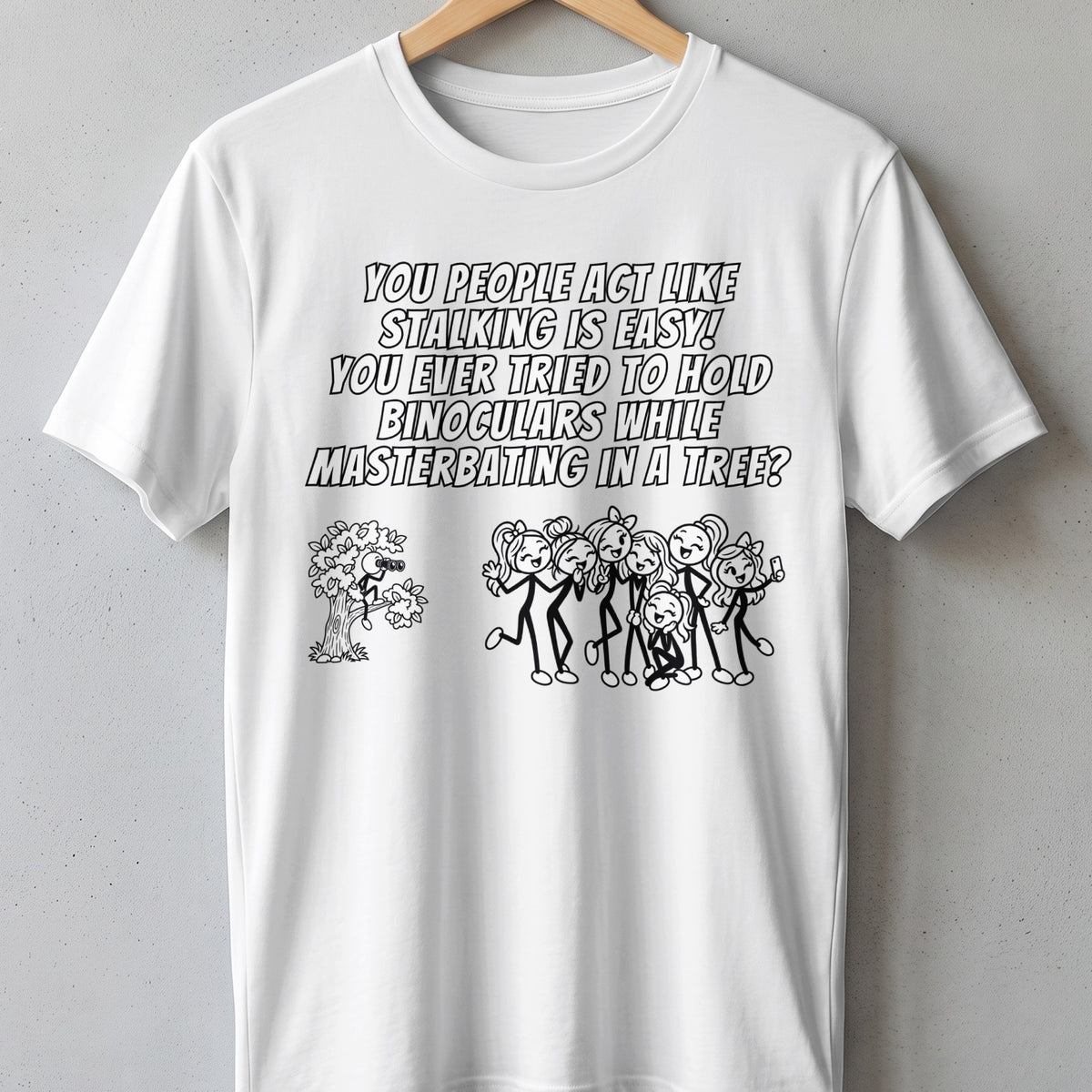 White t-shirt with text and cartoon drawing of stick figures.