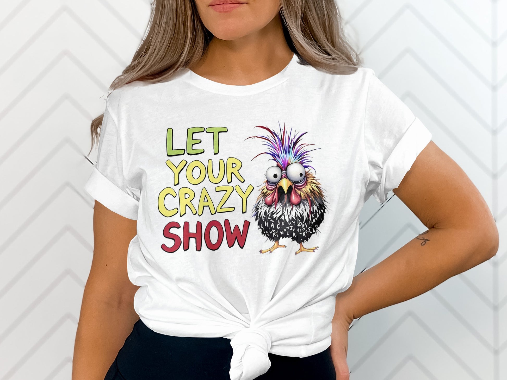 White t-shirt with "LET YOUR CRAZY SHOW" text and a cartoon chicken.