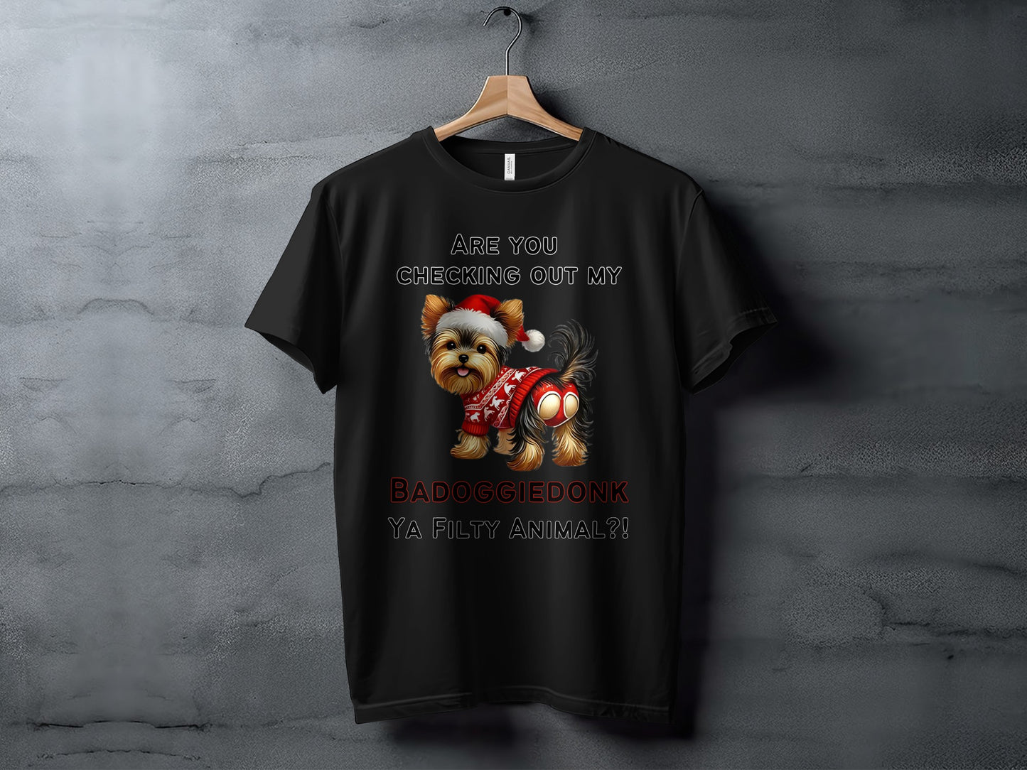 Black t-shirt with a Yorkshire Terrier wearing a Santa hat and Christmas sweater.