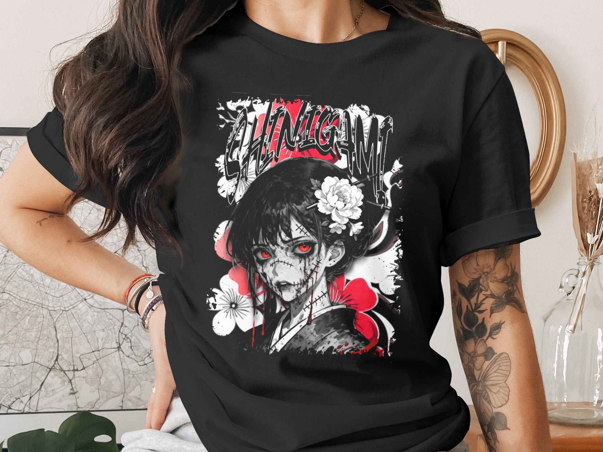 Black t-shirt featuring a manga-style dead bride with red eyes and stitched mouth.