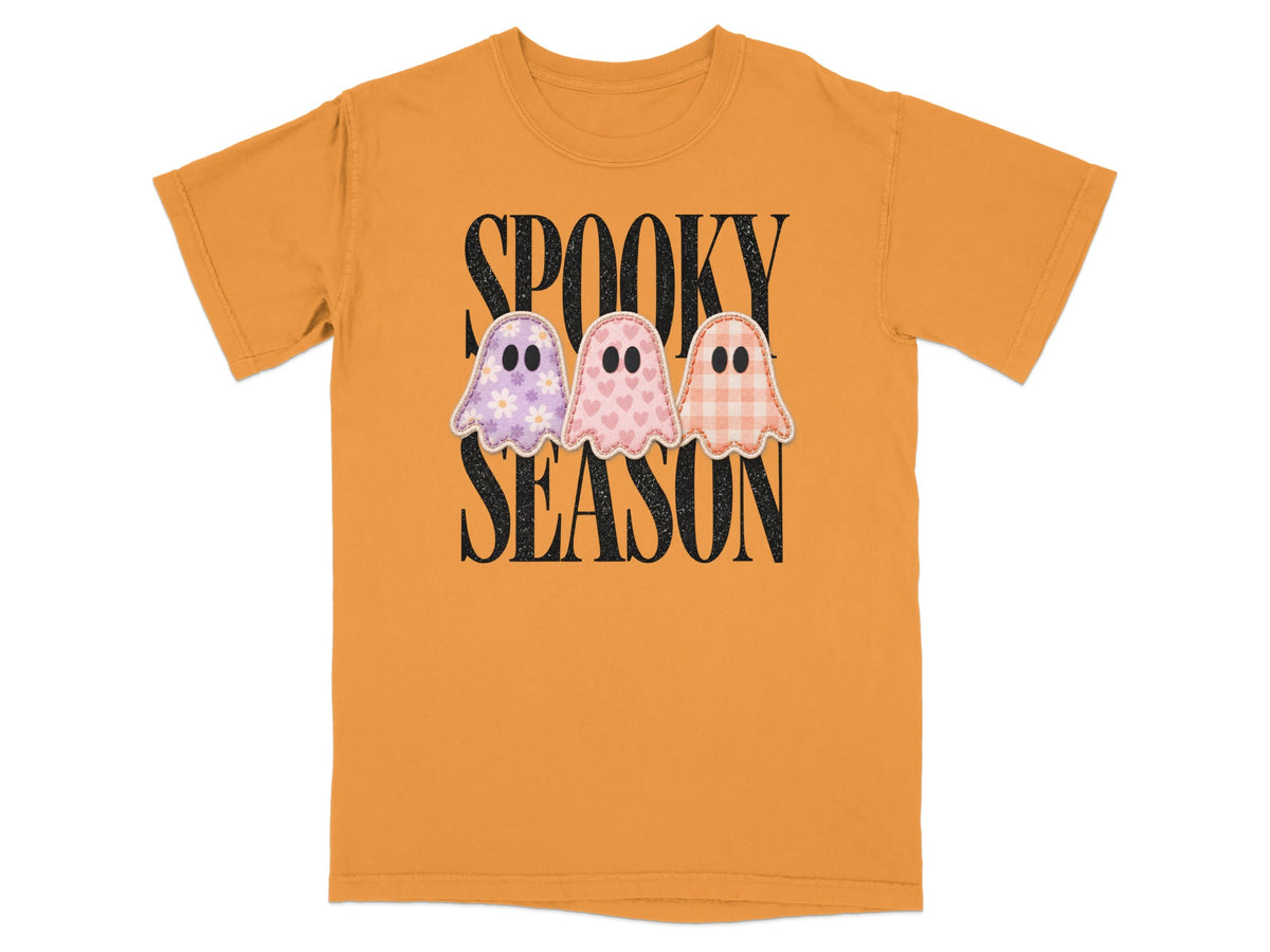 Orange t-shirt with "SPOOKY SEASON" text and three patterned ghosts.
