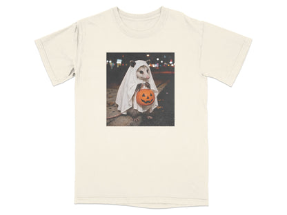 Opossum in ghost costume holding a jack-o'-lantern bucket at night.