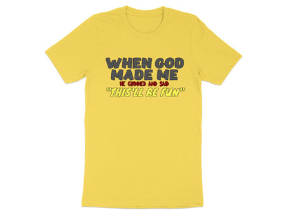 Yellow t-shirt with text: "WHEN GOD MADE ME HE GRINNED AND SAID 'THIS'LL BE FUN'"