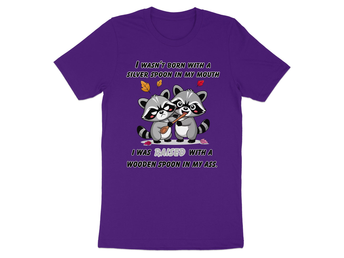 Purple t-shirt with two raccoons and text about being raised with a wooden spoon.