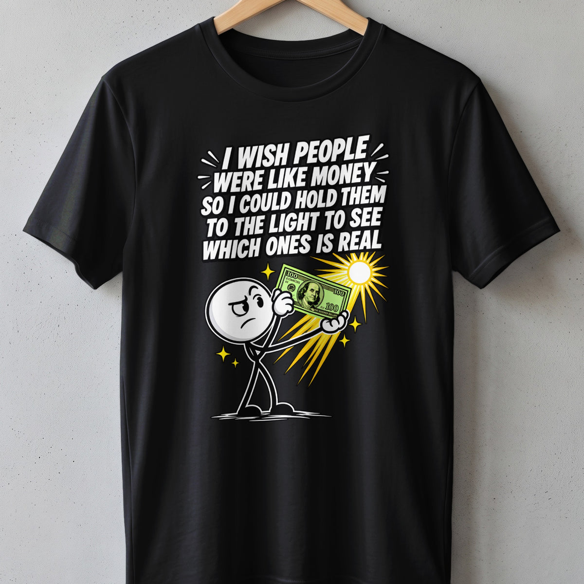 Black t-shirt with cartoon character holding money and text: "I wish people were like money..."