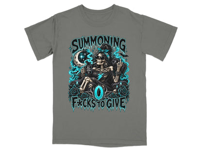 Gray t-shirt featuring a graphic of a skeleton wearing sunglasses and a bandana, surrounded by blue glowing text.