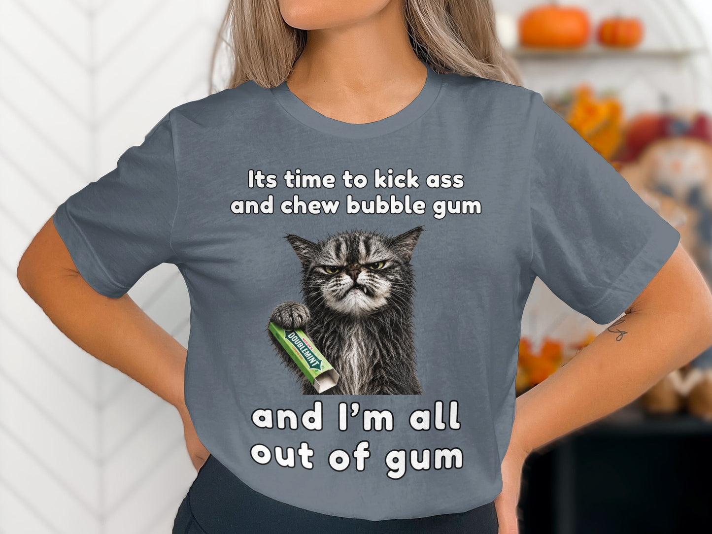 Grumpy cat holding Doublemint gum with text "its time to kick ass and chew bubble gum and I'm all out of gum."
