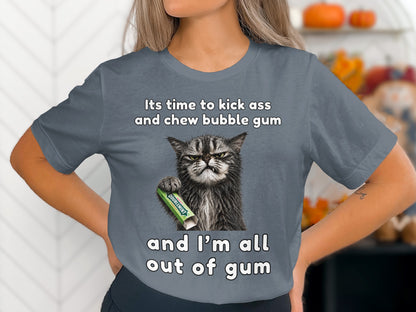 Grumpy cat holding Doublemint gum with text "its time to kick ass and chew bubble gum and I'm all out of gum."