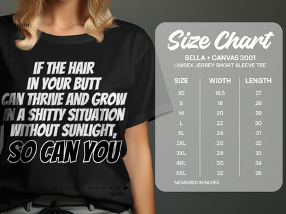 Black t-shirt with text and Bella + Canvas 3001 size chart.