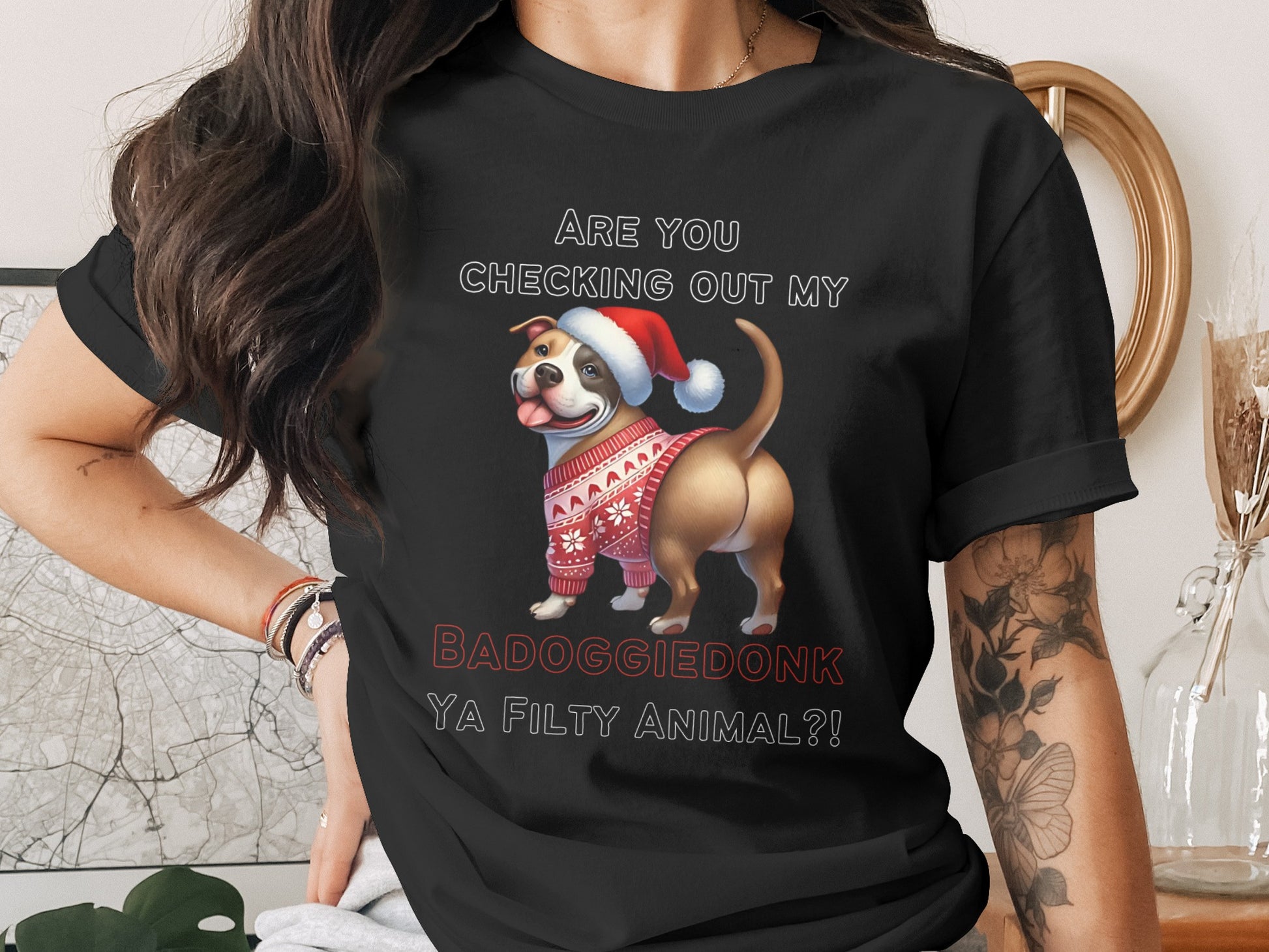 Black t-shirt with a bulldog wearing a Santa hat and sweater, saying "BADOGGIEDONK YA FILTY ANIMAL?!".