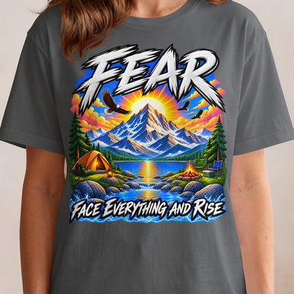 T-shirt with "FEAR EVERYTHING AND RISE" text and mountain camping scene.