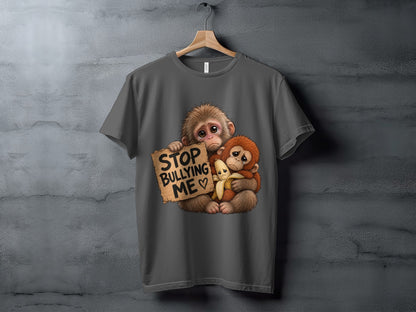 Two sad monkeys holding a sign that says "STOP BULLYING ME".