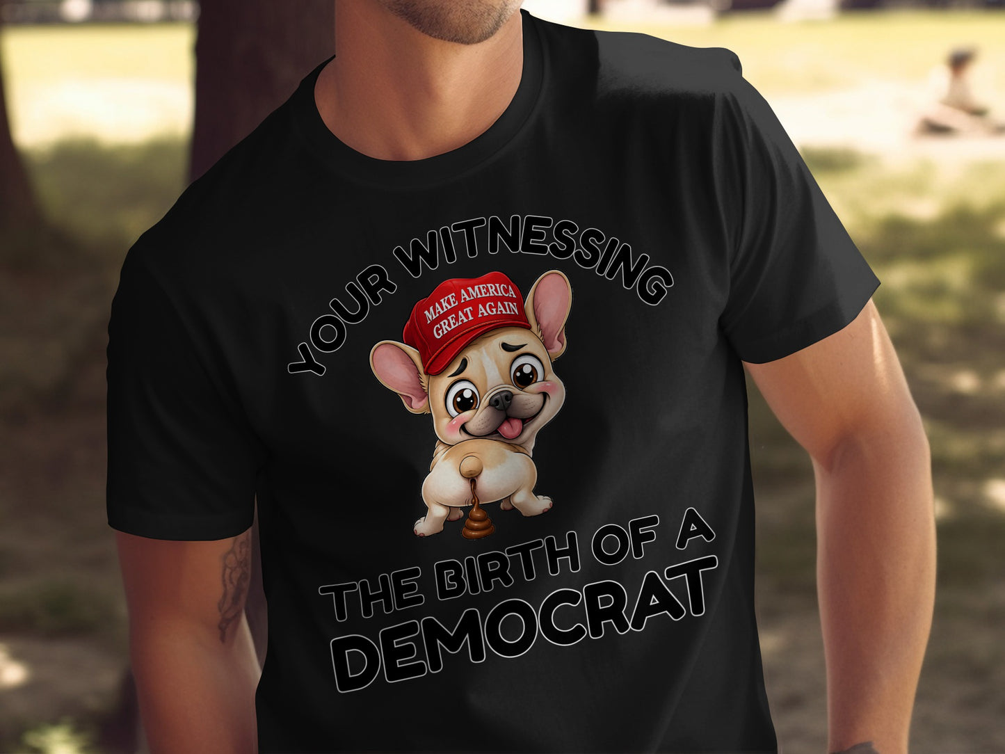 French Bulldog wearing MAGA hat with "The Birth of a Democrat" text.