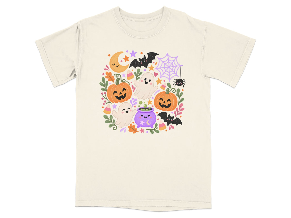 T-shirt with a festive Halloween graphic featuring pumpkins, ghosts, bats, and a moon.