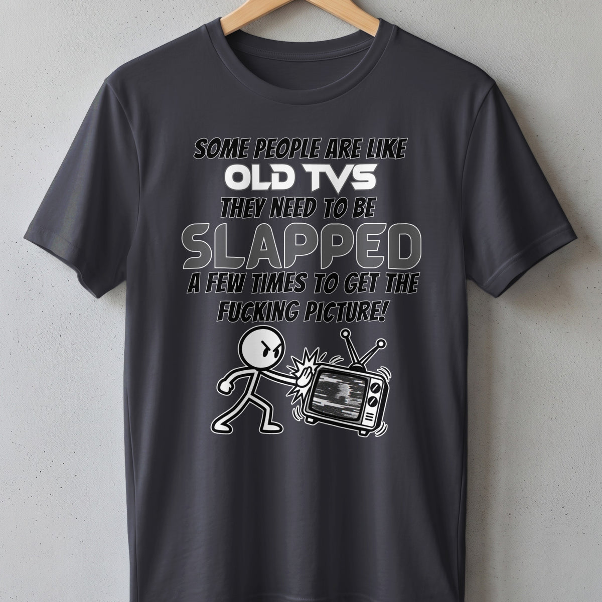 T-shirt graphic with text: "Some people are like old TVs. They need to be slapped."