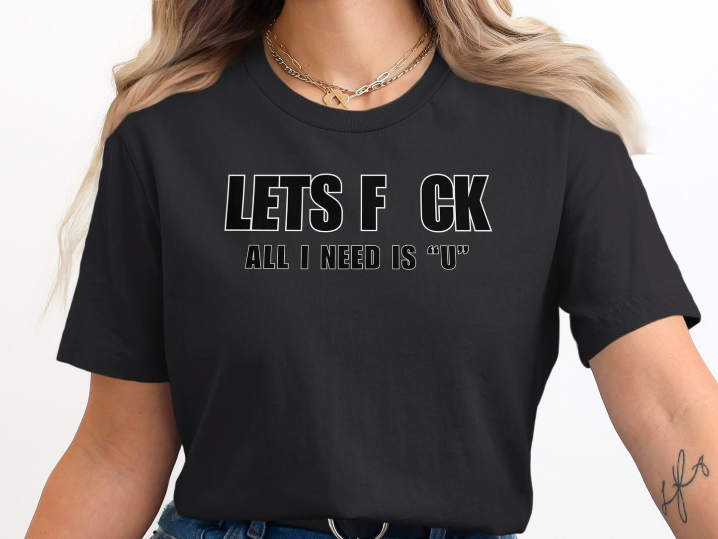 Black t-shirt with white text "LETS F CK ALL I NEED IS "U"".