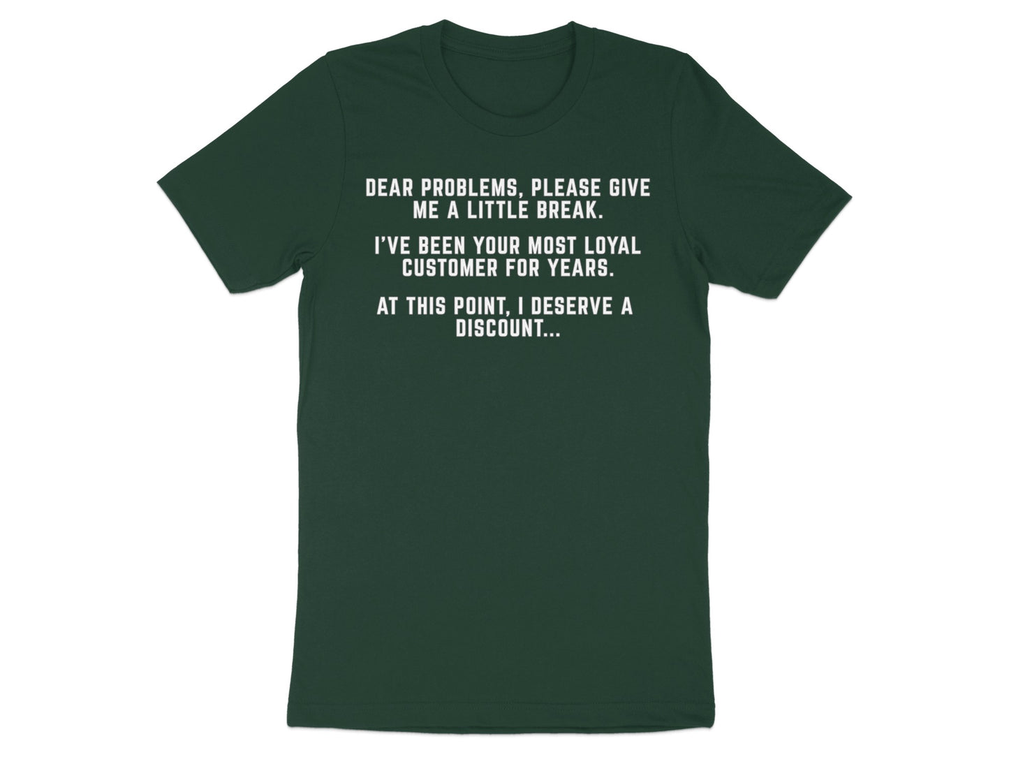 Dark green t-shirt with white text: "Dear problems, please give me a little break."
