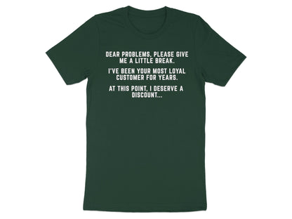 Dark green t-shirt with white text: "Dear problems, please give me a little break."
