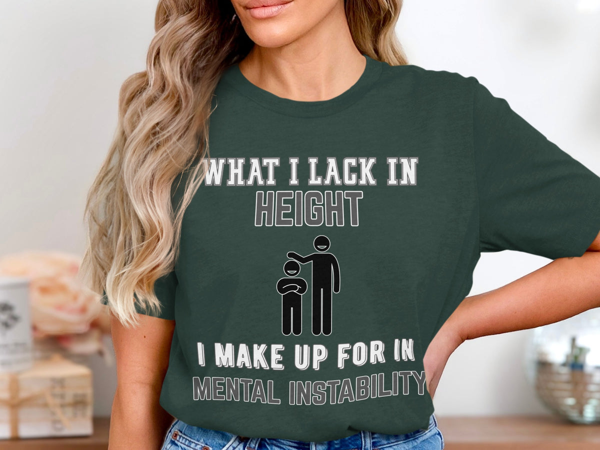 Green t-shirt with text "What I lack in height I make up for in mental instability" and stick figures.
