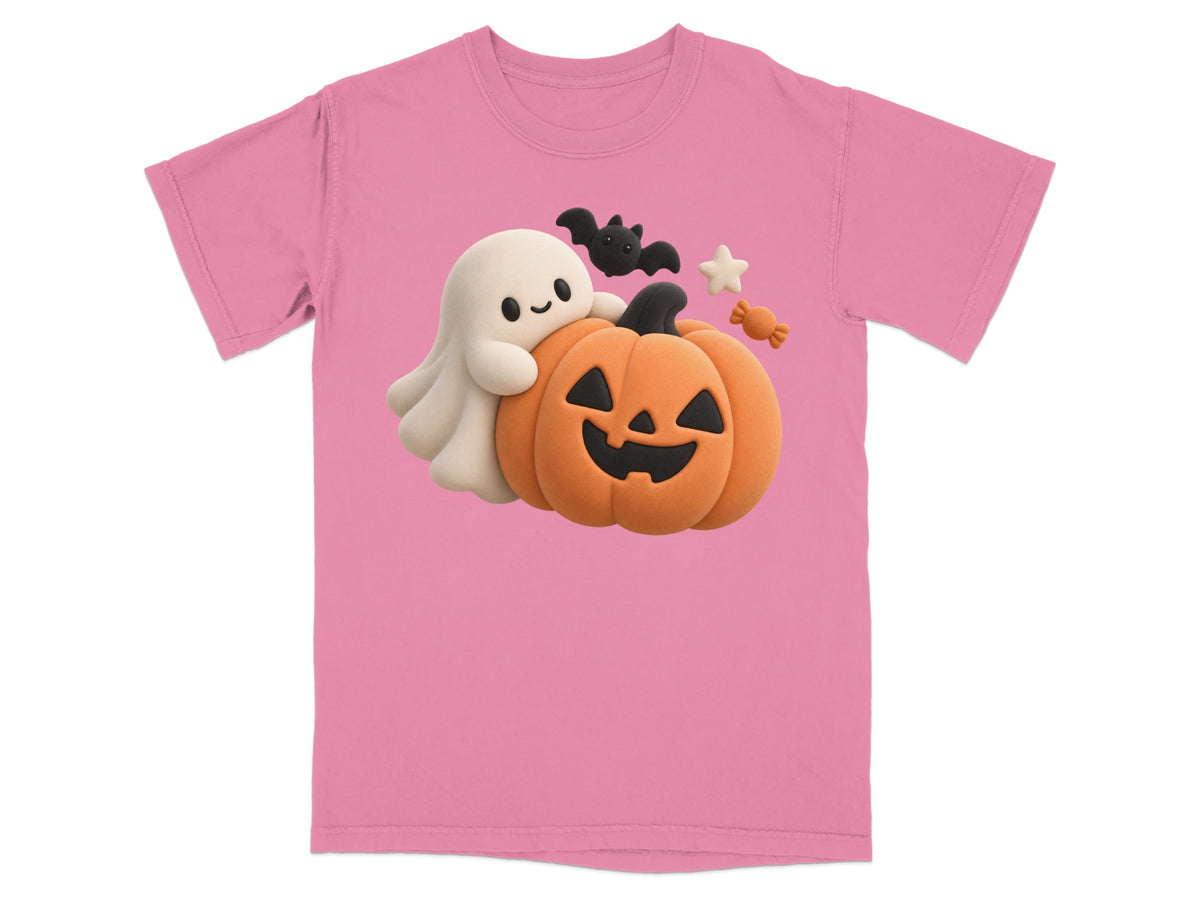 Pink t-shirt with a clay-style ghost, pumpkin, bat, and candy Halloween graphic.