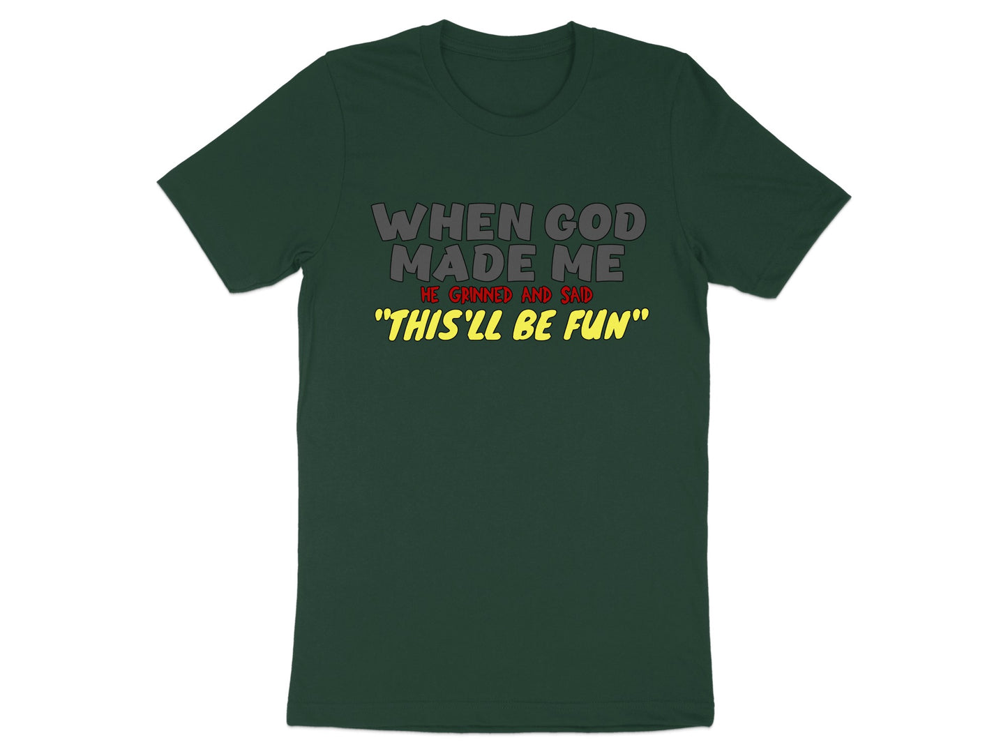 Dark green t-shirt with text "When God Made Me He Grinned and Said 'This'll Be Fun'".