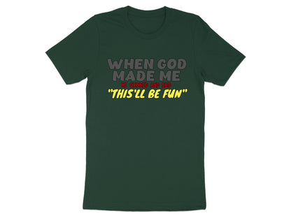 Dark green t-shirt with text "When God Made Me He Grinned and Said 'This'll Be Fun'".