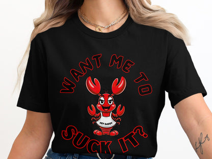 Black t-shirt with a cartoon lobster wearing an apron that says "HEY DADDY" and text that says "WANT ME TO SUCK IT?".