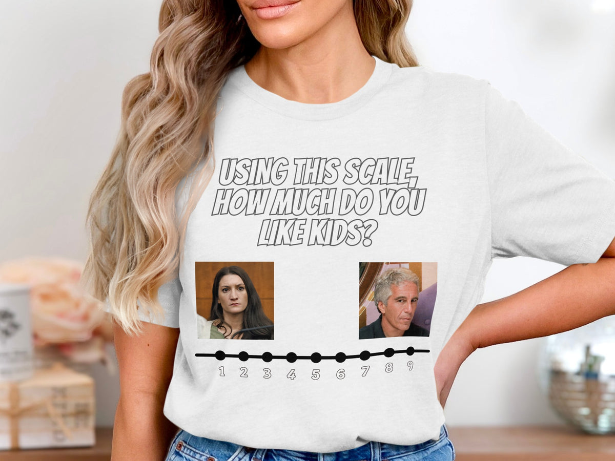 T-shirt with "USING THIS SCALE, HOW MUCH DO YOU LIKE KIDS?" and two photos on a scale.