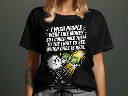 Black t-shirt with text and cartoon character holding a $100 bill.
