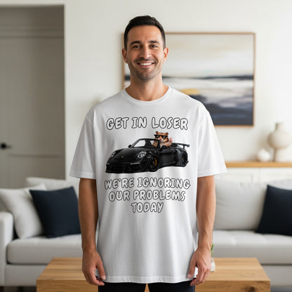 White t-shirt graphic with text and hamster driving a car.