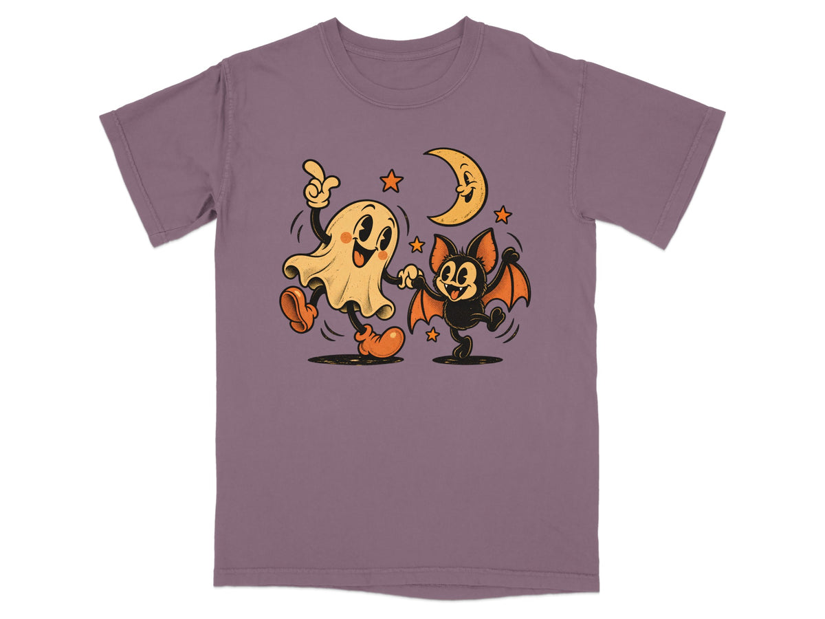 Ghost and bat characters dancing under a crescent moon with stars.