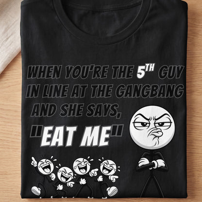 Black t-shirt with text and cartoon characters reading "When you're the 5th guy... 'Eat Me'"