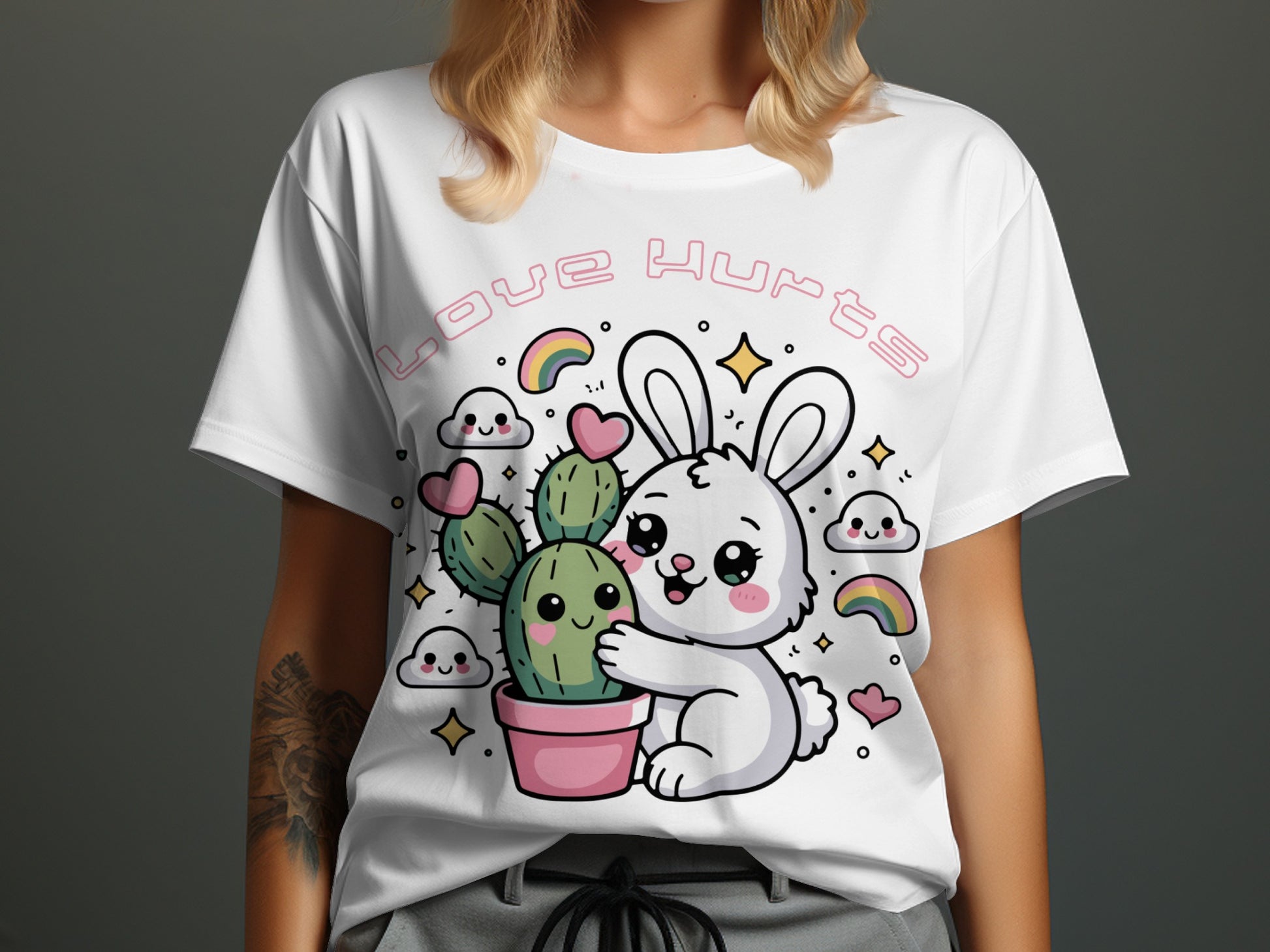 A white t-shirt with a graphic of a bunny hugging a cactus, with "LOVE HURTS" text.