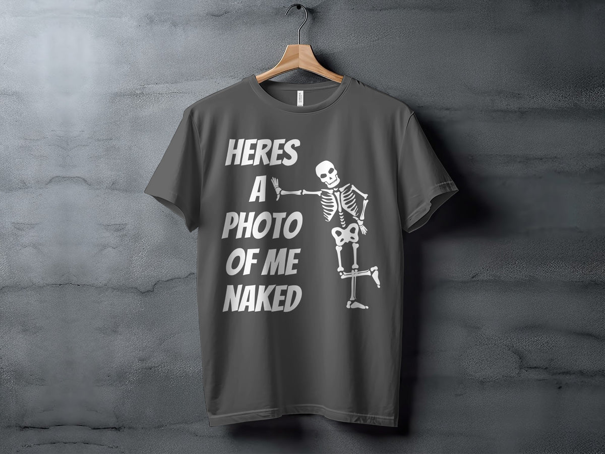 Dark gray t-shirt with white text "HERES A PHOTO OF ME NAKED" and a skeleton graphic.