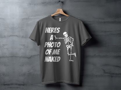 Dark gray t-shirt with white text "HERES A PHOTO OF ME NAKED" and a skeleton graphic.