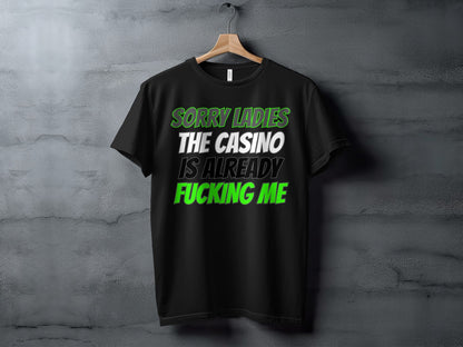 Black t-shirt with text "Sorry Ladies The Casino Is Already Fucking Me".