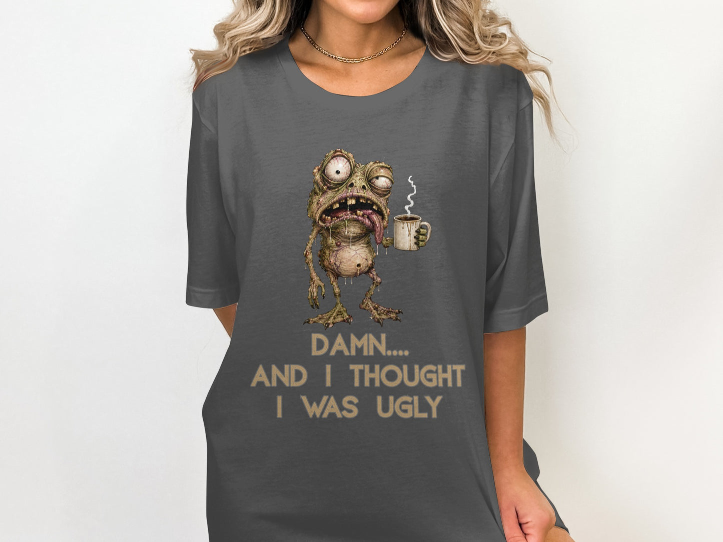 T-shirt with a cartoon frog holding coffee and text that reads "Damn... And I thought I was ugly".