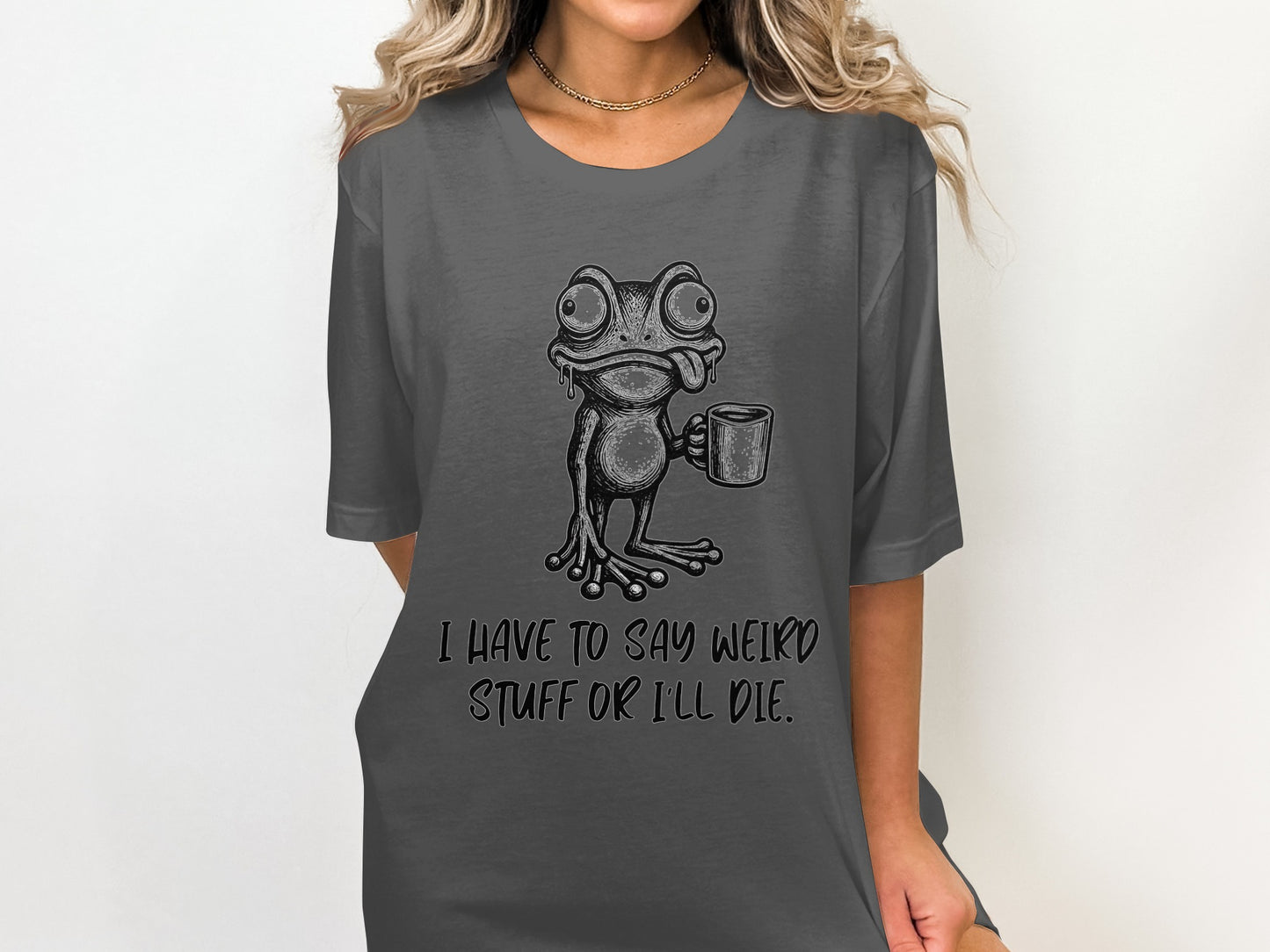 Dark gray t-shirt with a cartoon frog holding a mug and text.